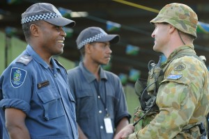 Trooper Trevor Kingston chats to Emmanuel Maepurina from the Royal Solomon Island Police force, prior to the Solomon Islands 32nd Independence Anniversary at Lawson Tama Stadium.