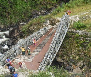 Collapsed bridge cutting off the flow of goods and services