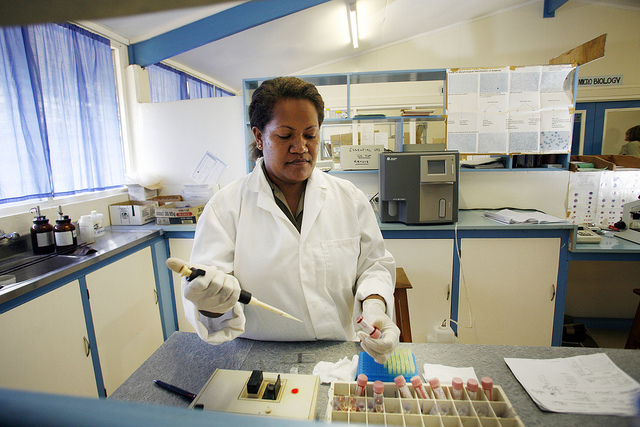 olomon Islands. Margaret Baekimia analysing a blood sample in the Pathology laboratory at the Kilu’ufi hospital. Photo: Rob Maccoll for AusAID.