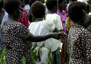 Shaking hands, Arawa, Bougainville (Flickr/Australian Civil-Military Centre/John Coombe CC BY 2.0)