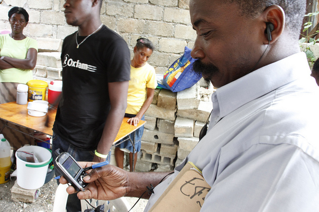 Using mobile phones to deliver aid messages after the earthquake in Haiti (Flickr/DFID/Russell Watkins CC BY-SA 2.0)