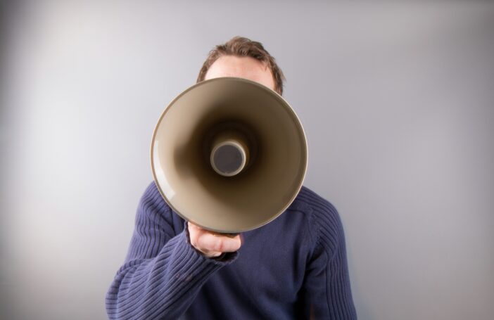 Man with a megaphone (publicdomainpictures.net)