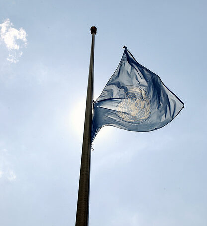 UN flag at half-mast (Flickr/UN Photo/Mark Garten CC BY-NC-ND 2.0)