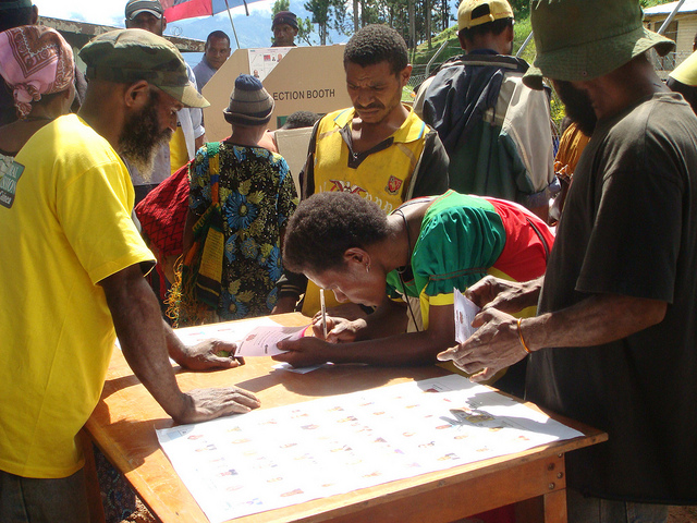 A voter marks her ballot during the 2012 elections in the PNG highlands (Flickr/Commonwealth Secretariat/Treva Braun CC BY NC ND 2.0)