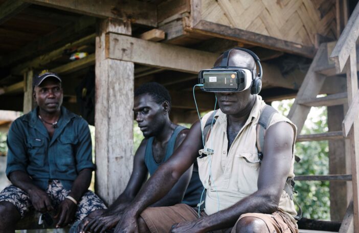 Former Bougainvillean combatant, now cocoa farmer Timothy Konovai tries out VR for the first time (image: World Bank/Alana Holmberg)