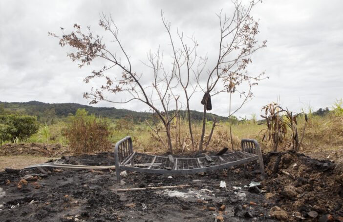 Remains of a house set alight during an attack targeting a family accused of sorcery, Southern Highlands Province (Jesse Boylan/ICRC)