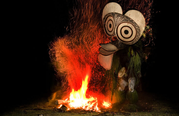 Fire dancer from the Baining tribe, PNG (Taro Taylor/Flickr/CC BY 2.0)