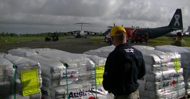 Humanitarian supplies being loaded for transport to Koro island (DFAT/Flickr/CC-BY-2.0)