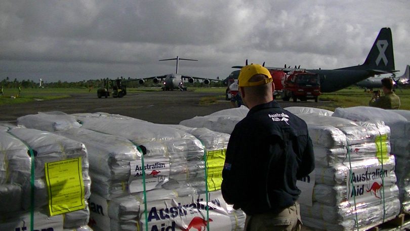Humanitarian supplies being loaded for transport to Koro island (DFAT/Flickr/CC-BY-2.0)