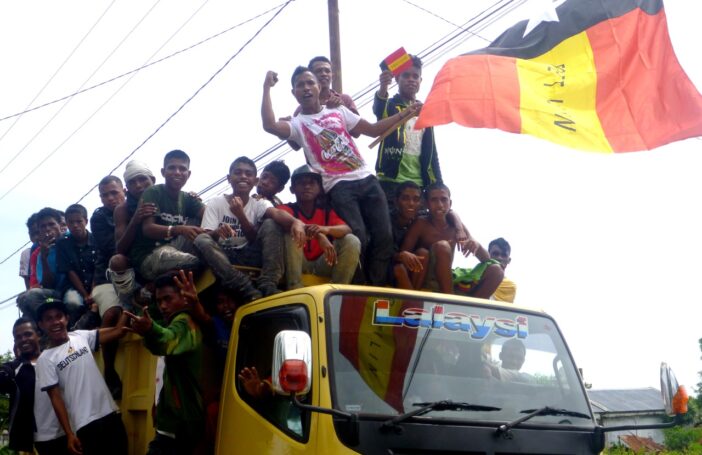 Youth getting energised for an election rally in East Timor (Kate Dixon/Flickr/CC BY 2.0)