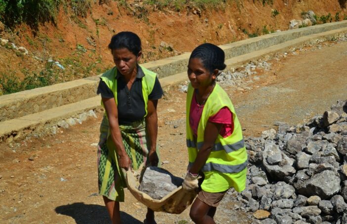 Women work on the Road for Development Programme in Timor-Leste; the improved road access for rural Timorese will hopefully bring economic benefits (ILO in Asia and the Pacific/Flickr/CC BY
