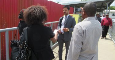 Madang MP Bryan Kramer talks to media after the hearing (Credit: Amanda H A Watson)