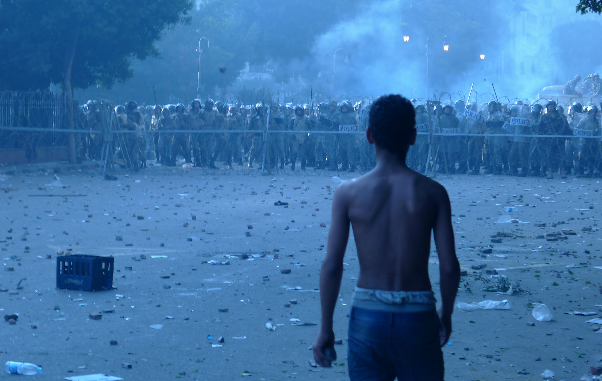 A boy confronts the Egyptian military police, just south of Tahrir Square, Cairo, in 2011 during the Arab Spring (Alisdare Hickson/Flickr/CC BY-SA 2.0)