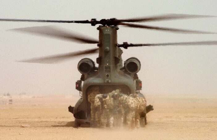 Royal marines board a helicopter (Think Defence/Flickr/CC BY-NC 2.0)