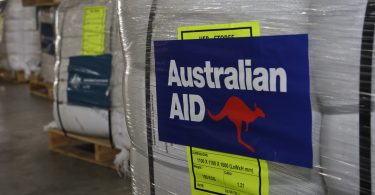 Pallets for AusAid emergency aid supplies are prepared for delivery to cyclone ravaged Fiji (DFAT/Flickr/CC BY 2.0)