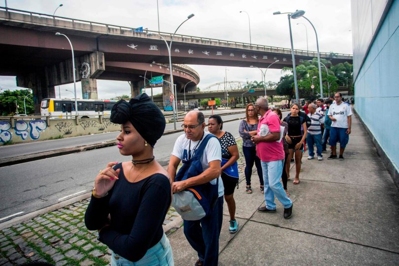 Brazilians lined up to cast their vote for president in October (Credit: Daniel Ramalho/Agence France-Presse/Getty Images)