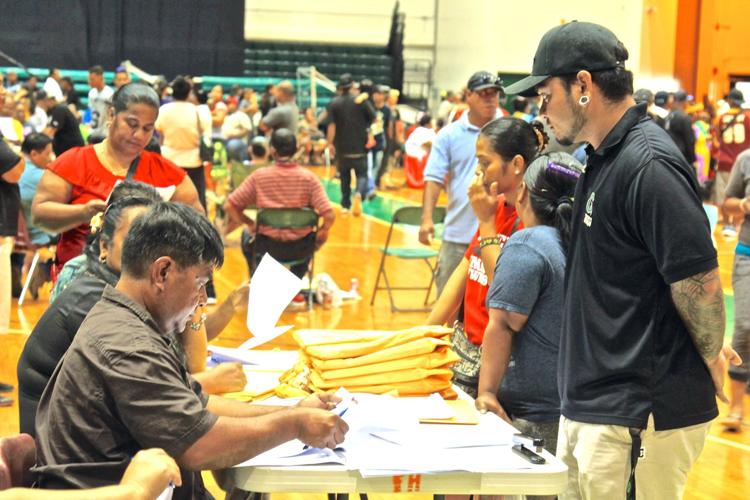 Voting for the FSM congressional election, at the University of Guam Calvo Field House in 2017 (Credit: Tihu Lujan/The Guam Daily Post)