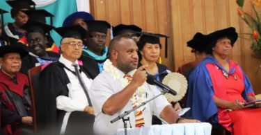 Prime Minister Marape addresses graduates at the Pacific Adventist University, December 2019 (Credit: PMNEC)
