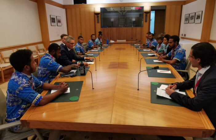 UPNG Summer School students met with Tim Bryson, Senior Adviser to Alex Hawke, Minister for International Development and the Pacific, at Parliament House (Credit: Rohan Fox)