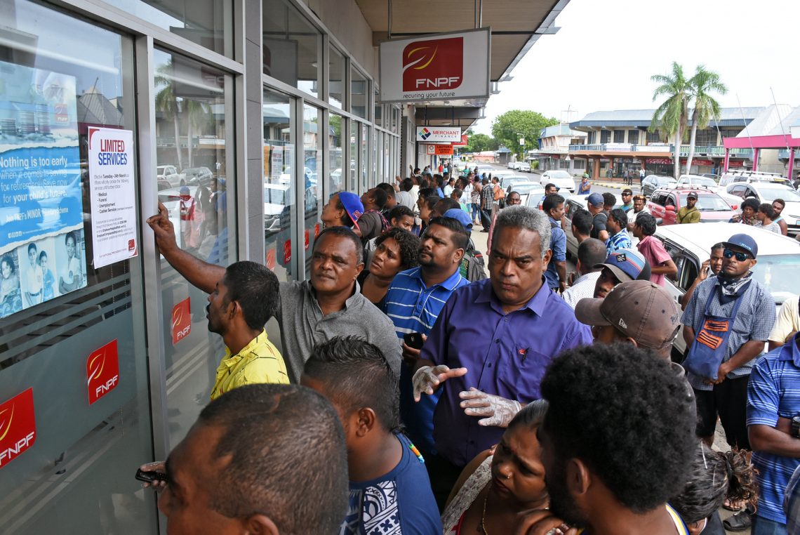 Crowds gathered outside the Fiji National Provident Fund office in Lautoka after the Budget announcement, ignoring social distancing (Credit: Fiji Times)