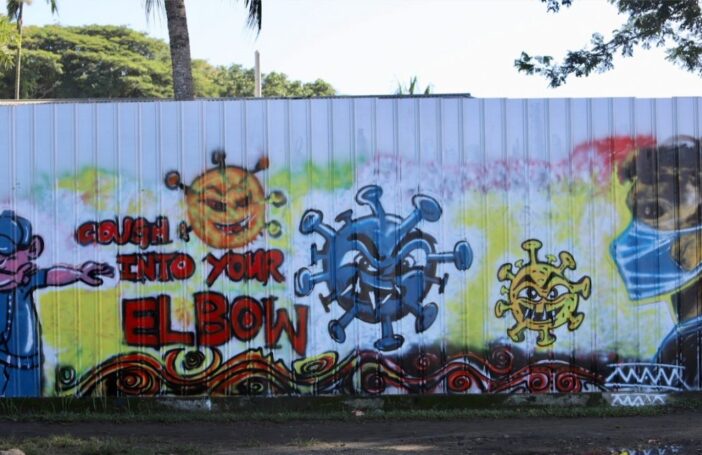 Artwork on the roadside in Madang town in PNG as part of the Madang Provincial Authority’s health communication strategy during COVID-19 (Photo credit: Professor Fr. Philip Gibbs)