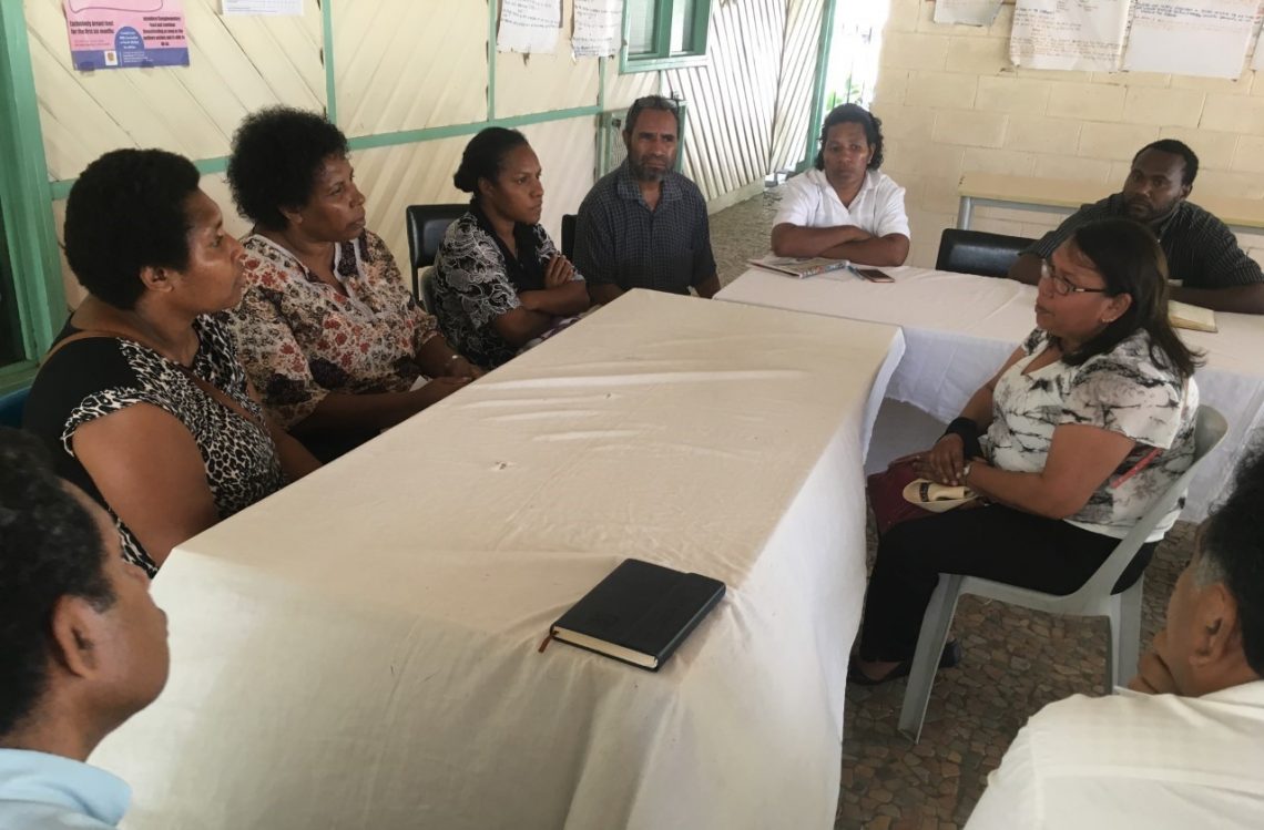 Ninti One’s Senior Aboriginal Researcher, Sharon Forrester in discussion with PNG health workers at the Six Mile Clinic in Port Moresby