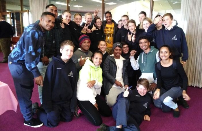 Timorese workers with friends from the local parish school in Warrnambool.