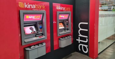 Photograph of two Kina Bank automatic teller machines in a Port Moresby shopping centre