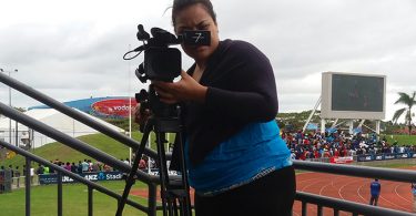 University of the South Pacific's Linda Filiai filming in the ANZ National Stadium.