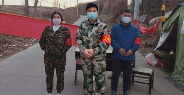 Village cadres at a COVID checkpoint in Nancun village, Hebei Province, China, January 2020