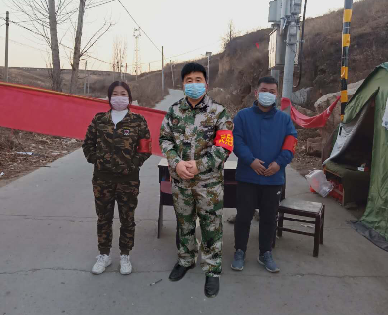 Village cadres at a COVID checkpoint in Nancun village, Hebei Province, China, January 2020