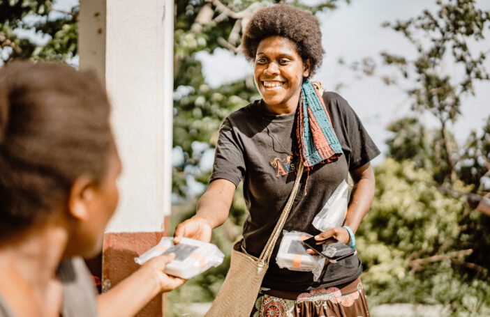 CARE's local team in Vanuatu distributing vital supplies to communities affected by Tropical Cyclone Harold in 2020 (Valerie Fernandez-CARE)