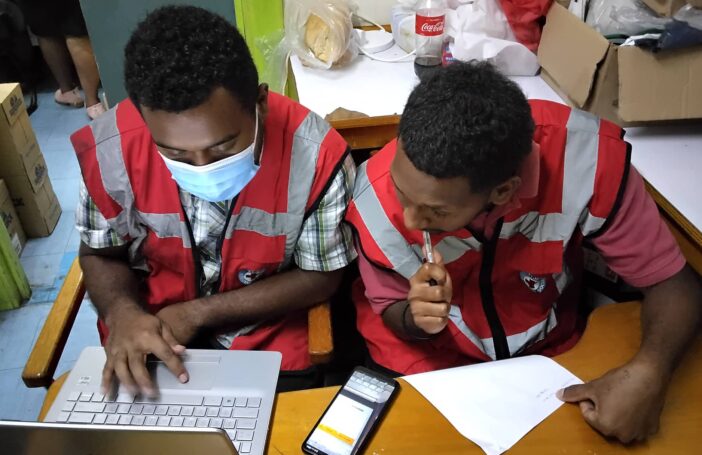 Fiji Red Cross volunteers working to assist the Fiji Ministry of Health (Fiji Red Cross Society)