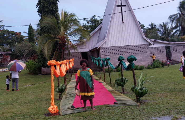 Zechariah's mother, Esther Suii, attending church service at Wingei Mt Zion Local Church, Papua New Guinea