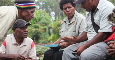 Community discussions about violence against women, White Ribbon Day, PNG, 2011