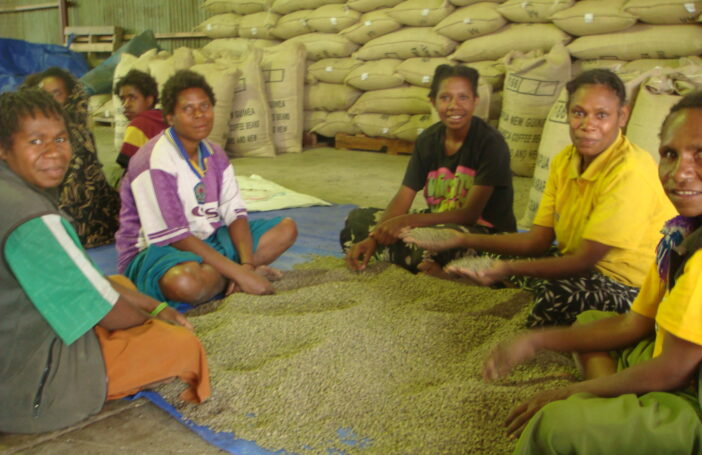 Women in the PNG Highlands sorting coffee beans (Commonwealth Secretariat-Flickr)