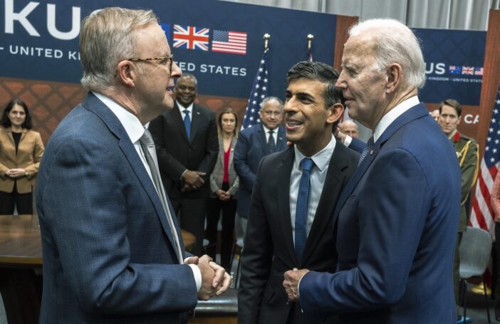 US President Joe Biden greets UK PM Rishi Sunak and Australian PM Anthony Albanese at the AUKUS bilateral meeting in March 2023.