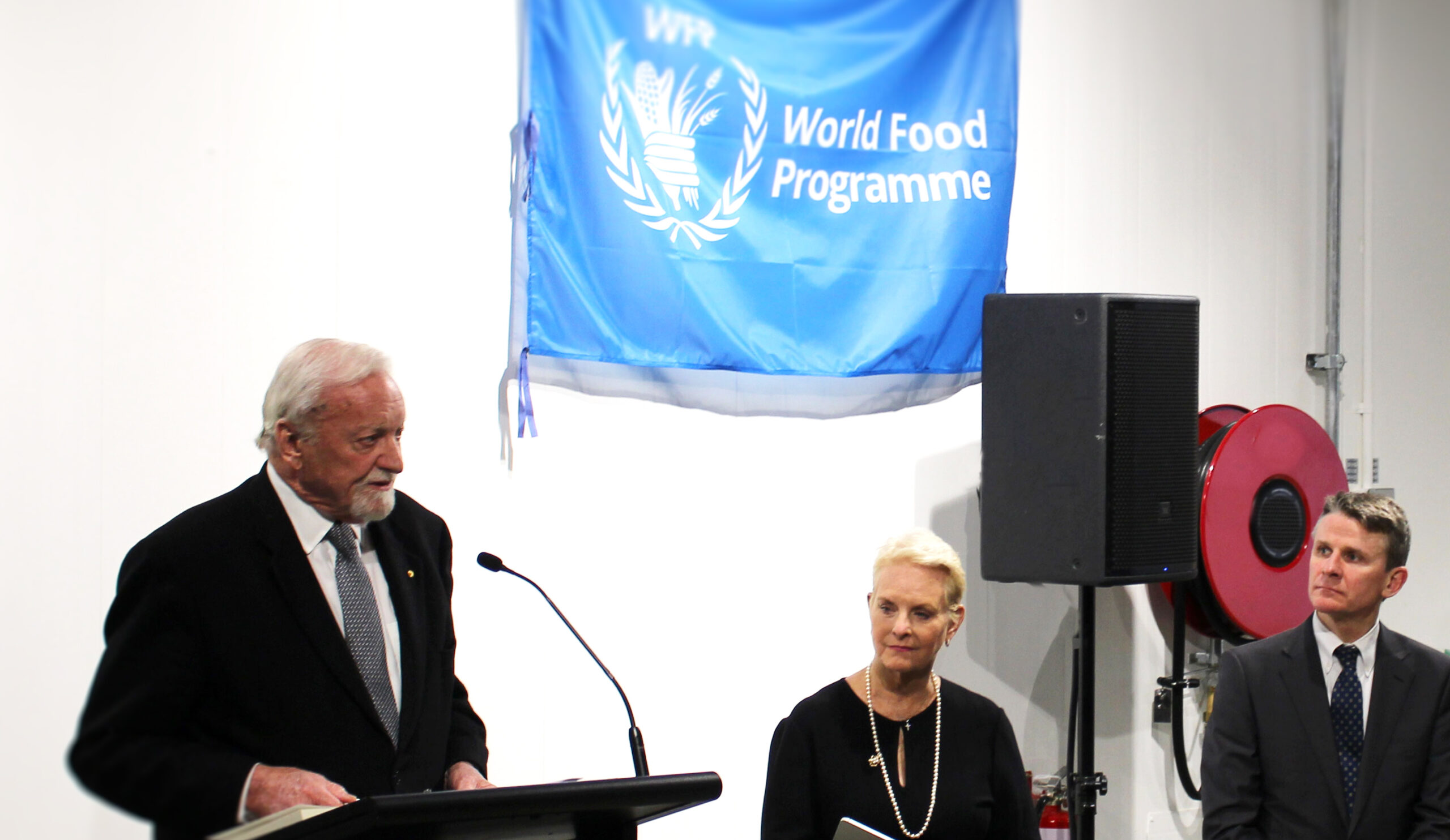 Gareth Evans speaks at the Jim Ingram Memorial alongside Cindy McCain and Rod Brazier of DFAT.