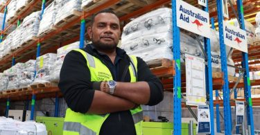 Kennedy Folasi works as a humanitarian warehouse store person, supplies are ready to be sent to countries affected by crisis.