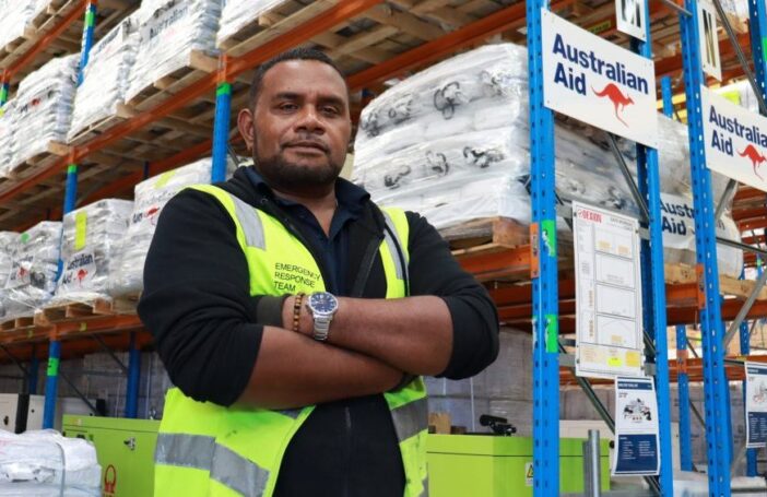 Kennedy Folasi works as a humanitarian warehouse store person, supplies are ready to be sent to countries affected by crisis.