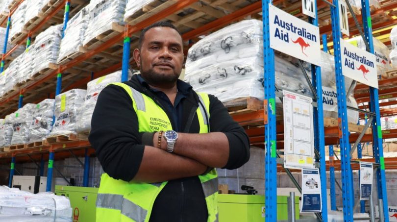 Kennedy Folasi works as a humanitarian warehouse store person, supplies are ready to be sent to countries affected by crisis.