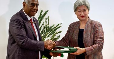 Kalsakau and Senator Penny Wong sign the bilateral agreement in Port Vila in December 2022 (Penny Wong - Senator for SA-Facebook)
