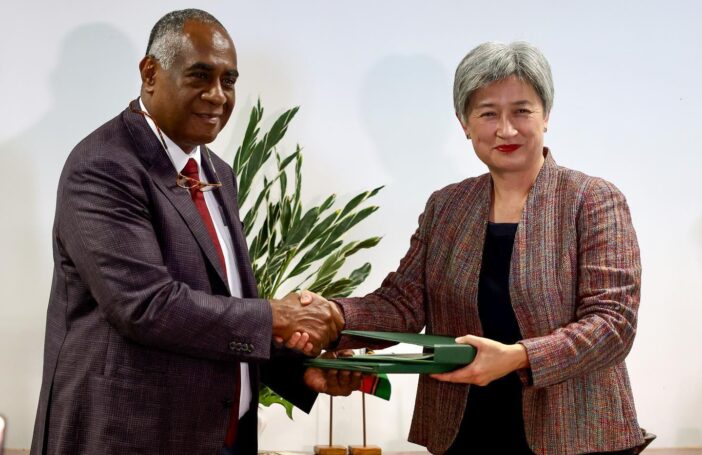 Kalsakau and Senator Penny Wong sign the bilateral agreement in Port Vila in December 2022 (Penny Wong - Senator for SA-Facebook)