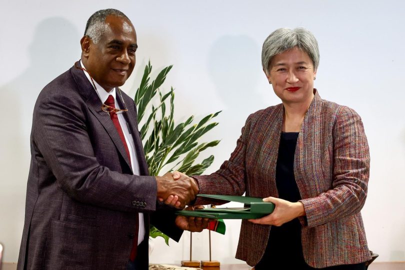 Kalsakau and Senator Penny Wong sign the bilateral agreement in Port Vila in December 2022 (Penny Wong - Senator for SA-Facebook)