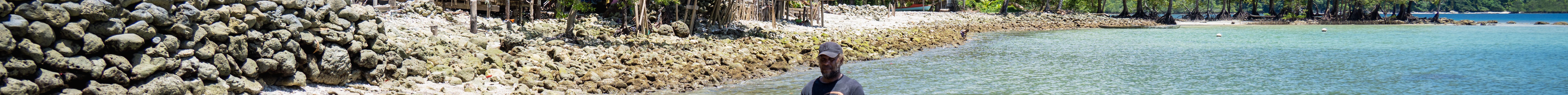 Martin Hau’ato stands where there used to be dry land and houses of Muki Community in the Solomon Islands (Ivan Utahenua-Oxfam)