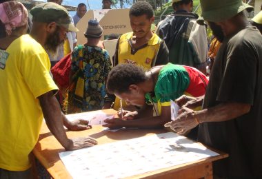 Woman voting in the PNG Highlands during the 2012 election
