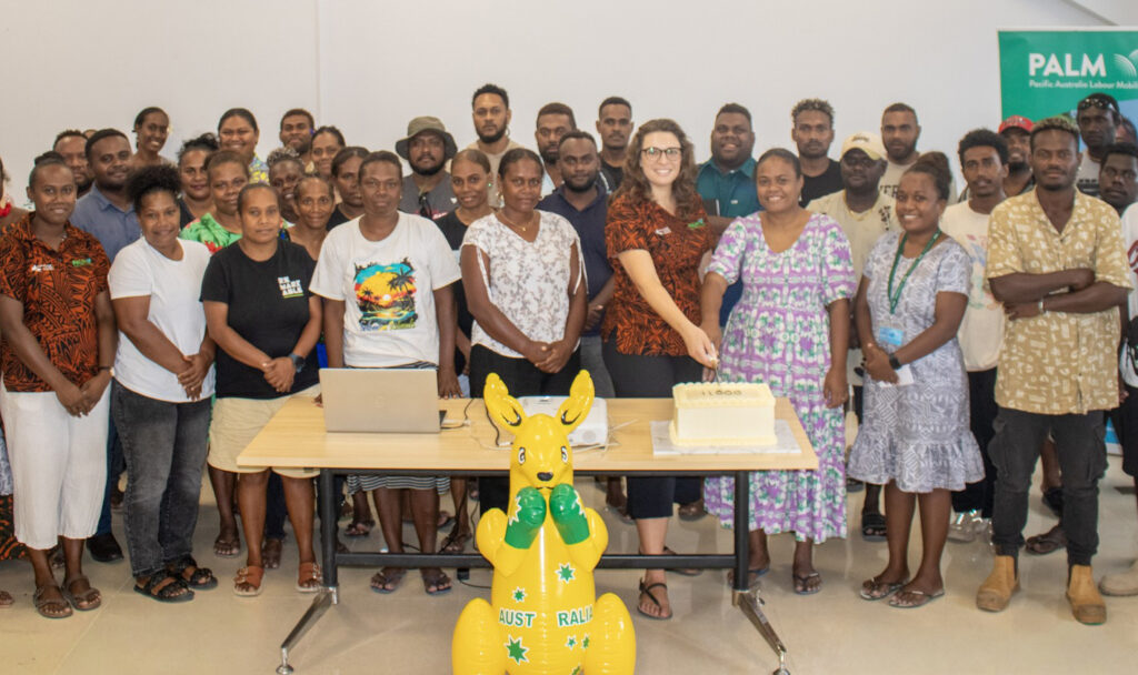 30 PALM workers from Solomon Islands with cake