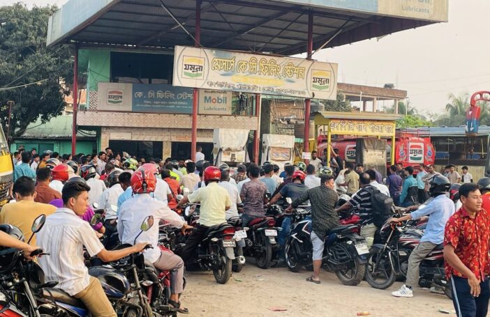 Motorcyclists queue for fuel in Dhaka, Bangladesh
