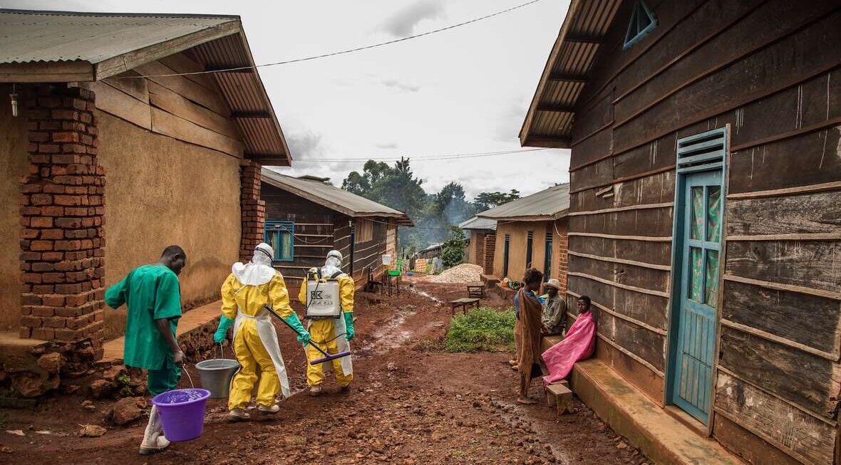 Health workers disinfect Case Du Salut health facility in Mabalako, North Kivu, Democratic Republic of Congo, one of the 37 health facilities being supported by the International Rescue Committee. A n