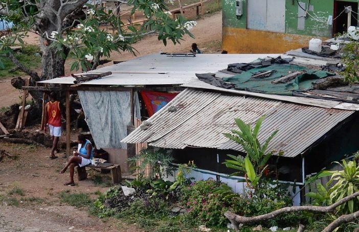 Poverty Under a Frangipani Tree (23228737364)